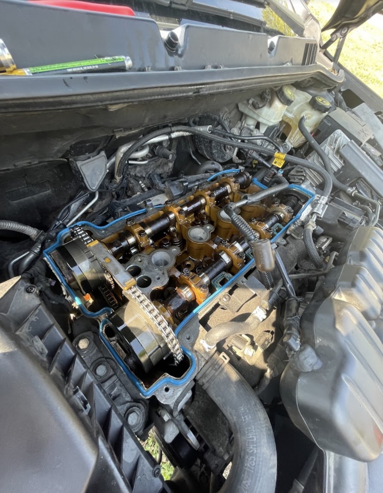 Valve cover gasket & timing chain service